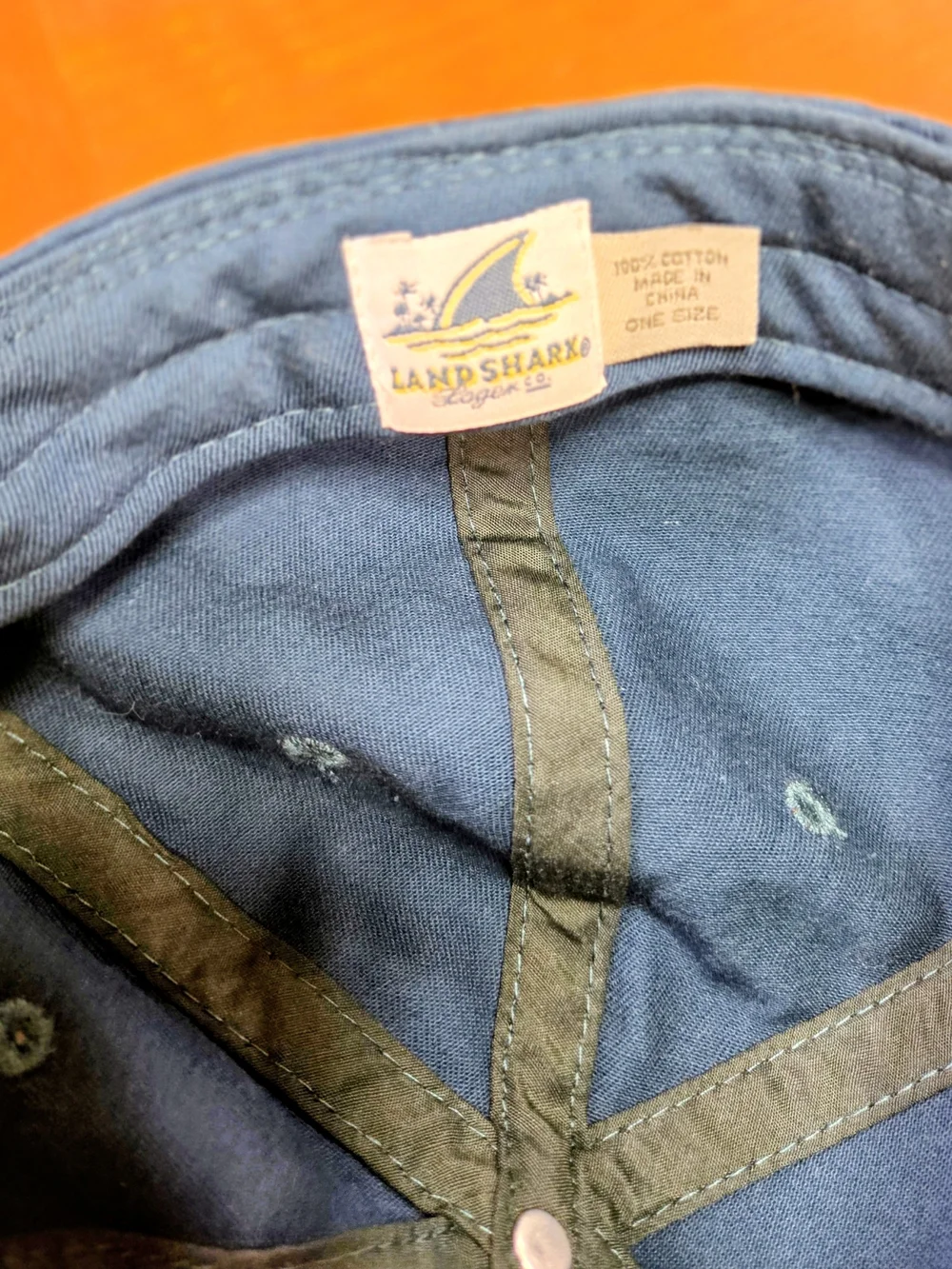 Embroidered Blue Baseball Cap with Yellow Shark Fin Motif